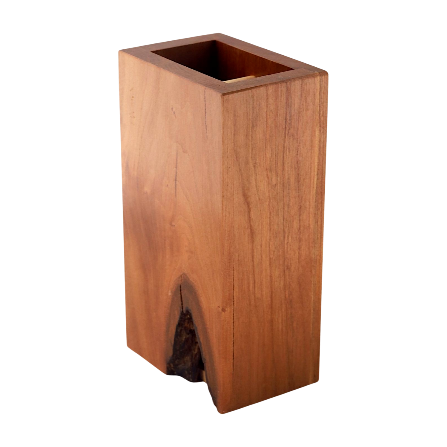 Small cherry dice tower with large knot on the back on a white background