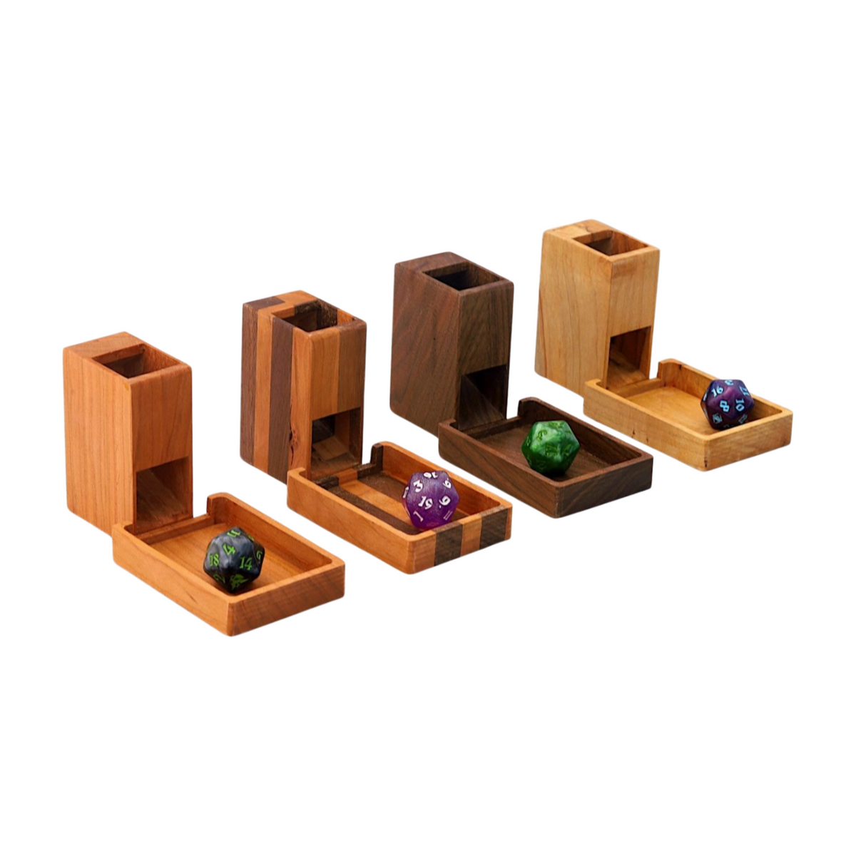 Four wooden dice towers and trays with dice on a white background
