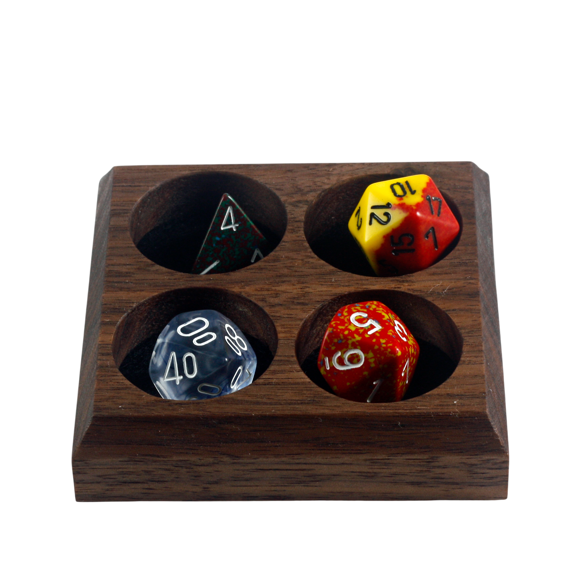 A wooden four-die display tray holding four polyhedral gaming dice, shown on a plain white background.